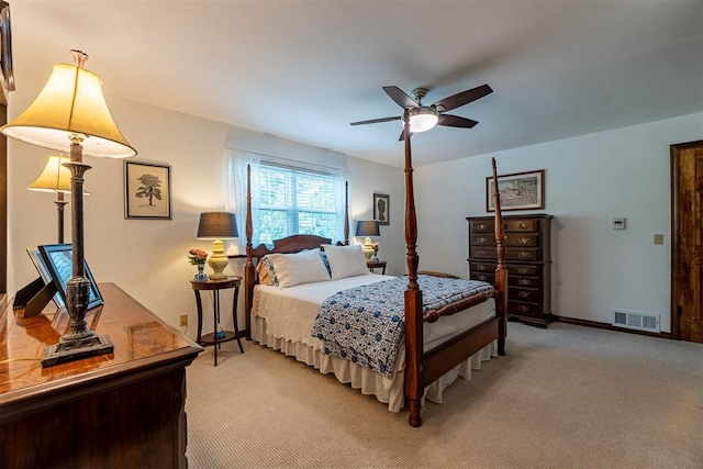 3824 Smoking Oaks Dr, Oklahoma City, OK 73150 - bedroom featuring light carpet, a ceiling fan, and baseboards