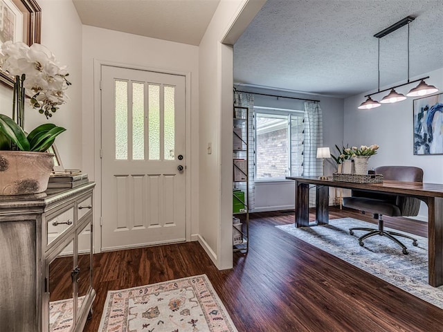 2009 Bella Vista Dr, Edmond, OK 73013 - foyer with dark wood-style floors, baseboards, and a textured ceiling