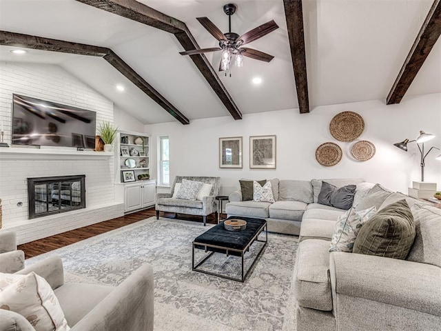 2009 Bella Vista Dr, Edmond, OK 73013 - living room featuring wood finished floors, ceiling fan, a brick fireplace, and recessed lighting