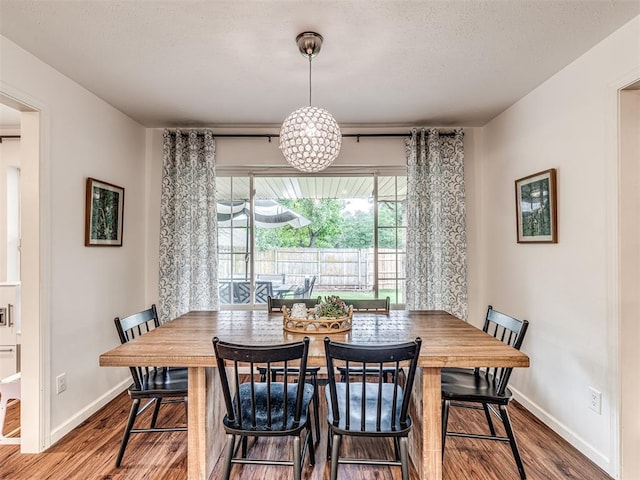 2009 Bella Vista Dr, Edmond, OK 73013 - dining room featuring wood finished floors and baseboards