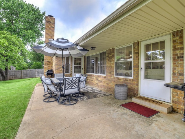 2009 Bella Vista Dr, Edmond, OK 73013 - view of patio featuring outdoor dining space