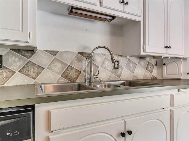 212 W Ridgewood Dr, Midwest City, OK 73130 - kitchen with a sink, white cabinetry, and dark countertops