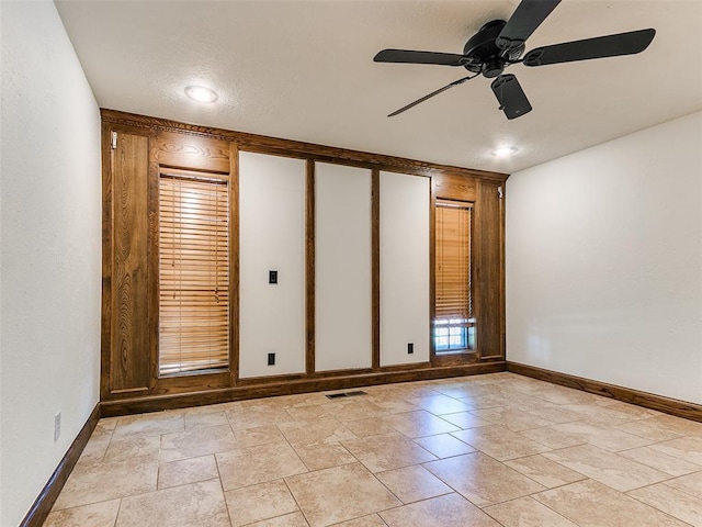 212 W Ridgewood Dr, Midwest City, OK 73130 - empty room with a ceiling fan and baseboards