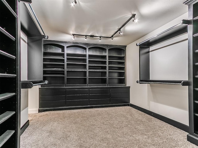 212 W Ridgewood Dr, Midwest City, OK 73130 - walk in closet featuring carpet flooring