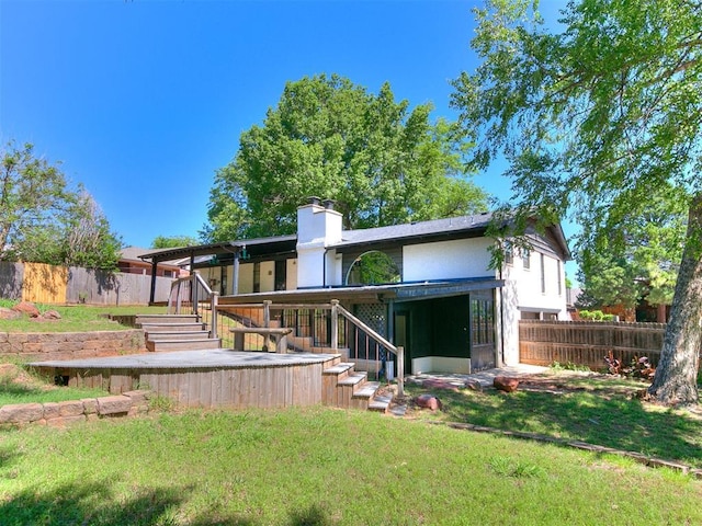 212 W Ridgewood Dr, Midwest City, OK 73130 - rear view of property with stairway and a chimney