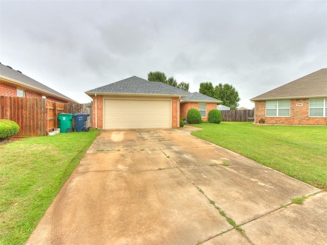 4537 SE 80th St, Del City, OK 73135 - view of front of property with brick siding, concrete driveway, and a garage
