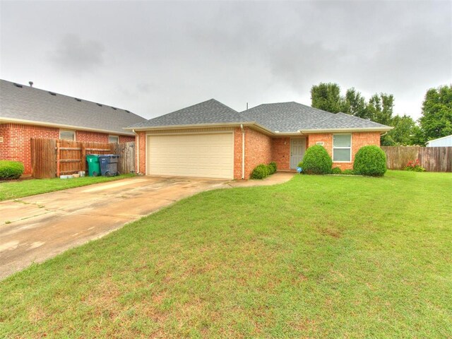 4537 SE 80th St, Del City, OK 73135 - single story home with an attached garage, brick siding, and driveway