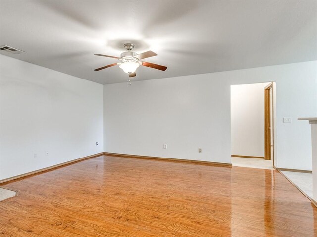 4537 SE 80th St, Del City, OK 73135 - unfurnished room with a ceiling fan, wood finished floors, and baseboards