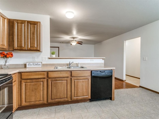 4537 SE 80th St, Del City, OK 73135 - kitchen with black appliances, a sink, ceiling fan, brown cabinets, and light countertops