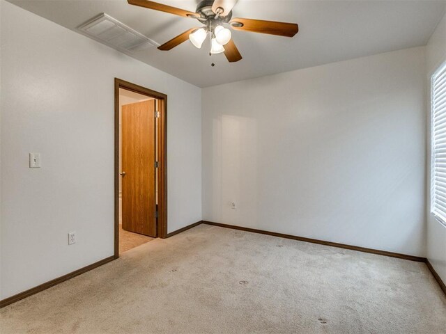 4537 SE 80th St, Del City, OK 73135 - unfurnished room with light colored carpet, ceiling fan, and baseboards