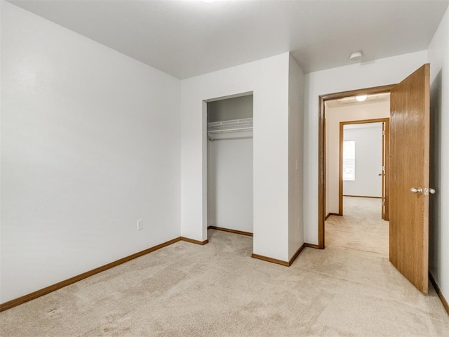 4537 SE 80th St, Del City, OK 73135 - unfurnished bedroom featuring light carpet, baseboards, and a closet