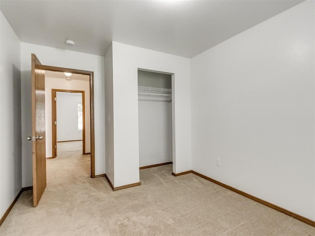 4537 SE 80th St, Del City, OK 73135 - unfurnished bedroom with light colored carpet, baseboards, and a closet