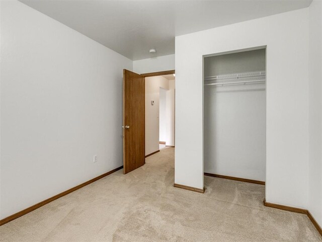 4537 SE 80th St, Del City, OK 73135 - unfurnished bedroom with carpet, a closet, and baseboards