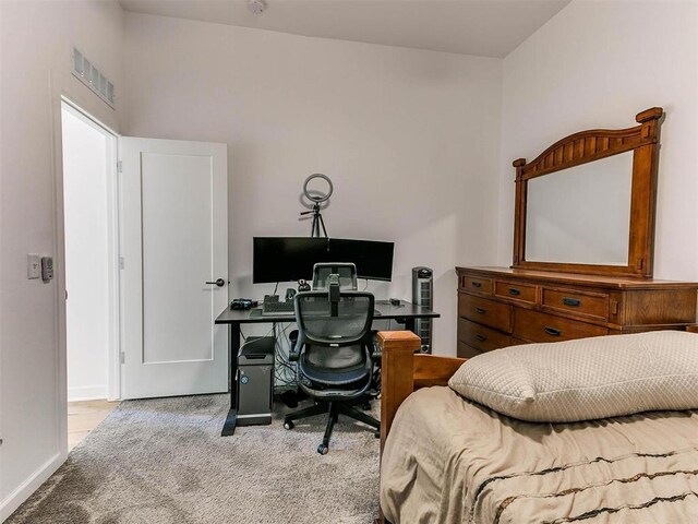 16125 Buffalo Dr, Moore, OK 73170 - carpeted bedroom featuring a desk and baseboards