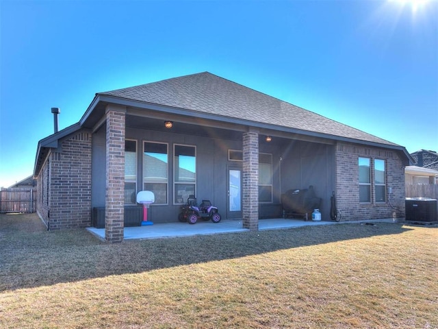 16125 Buffalo Dr, Moore, OK 73170 - rear view of property with brick siding, a patio area, central air condition unit, and roof with shingles