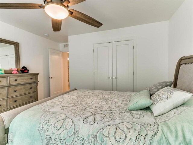 16125 Buffalo Dr, Moore, OK 73170 - bedroom featuring a ceiling fan and a closet