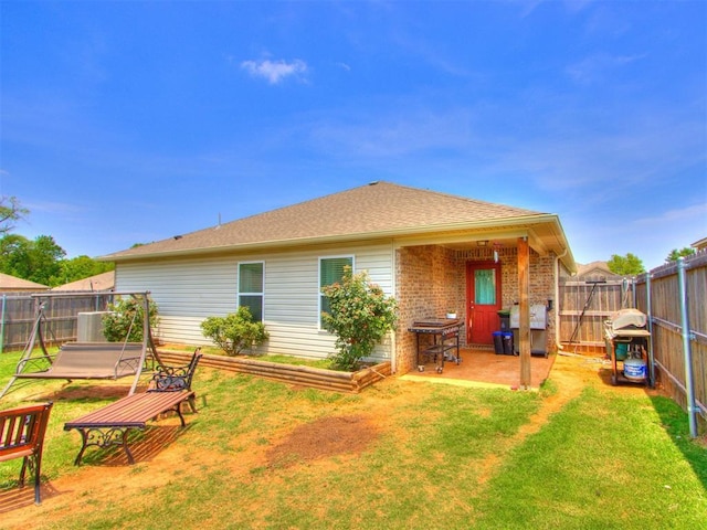9436 SW 37th St, Oklahoma City, OK 73179 - back of house featuring brick siding and a patio area