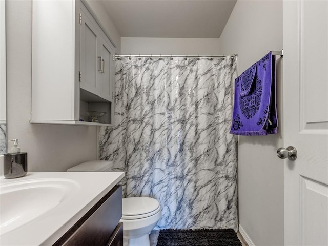 9436 SW 37th St, Oklahoma City, OK 73179 - bathroom featuring vanity, toilet, and a shower with shower curtain