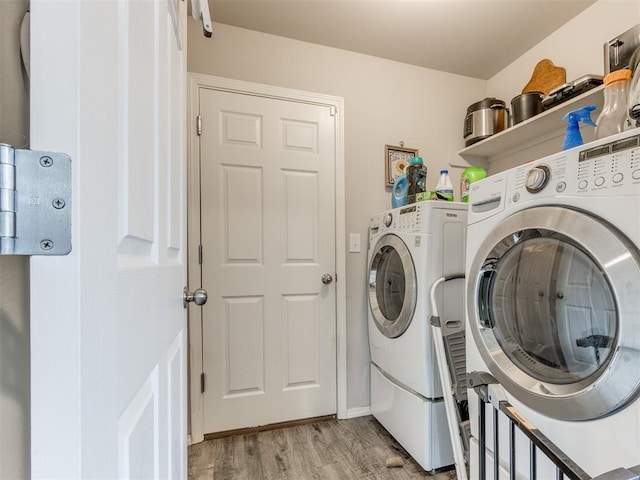 9436 SW 37th St, Oklahoma City, OK 73179 - laundry room with separate washer and dryer and light wood-style flooring