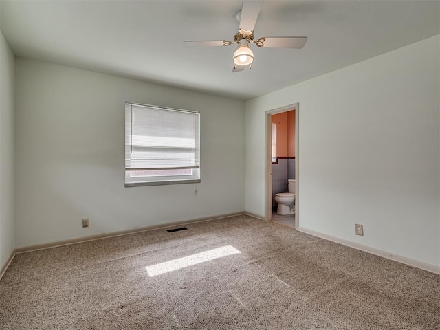 4809 N Pate Ave, Oklahoma City, OK 73112 - spare room featuring carpet, a ceiling fan, and baseboards