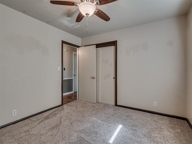 4809 N Pate Ave, Oklahoma City, OK 73112 - unfurnished bedroom featuring carpet, a closet, baseboards, and a ceiling fan