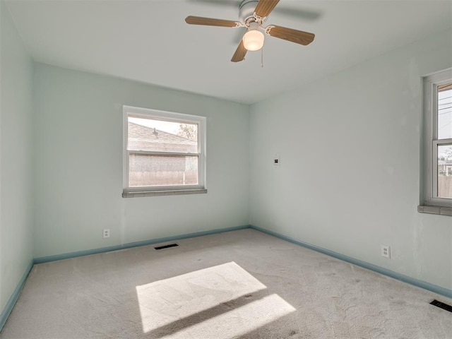 4809 N Pate Ave, Oklahoma City, OK 73112 - carpeted empty room featuring healthy amount of natural light, baseboards, and a ceiling fan