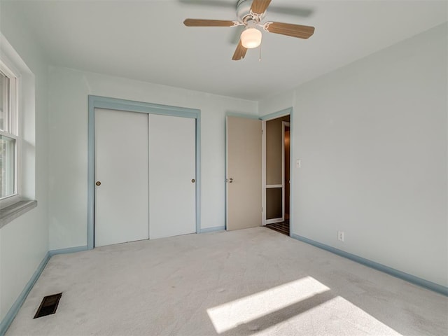 4809 N Pate Ave, Oklahoma City, OK 73112 - unfurnished bedroom featuring light carpet, a closet, ceiling fan, and baseboards