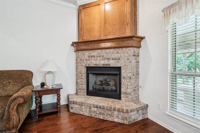 2632 SE 97th St, Moore, OK 73160 - detailed view of a fireplace, wood finished floors, ornamental molding, and baseboards