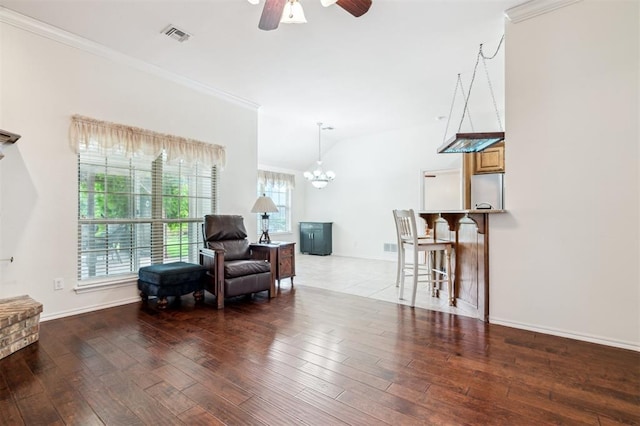 2632 SE 97th St, Moore, OK 73160 - sitting room featuring ornamental molding, hardwood / wood-style flooring, a ceiling fan, a chandelier, and baseboards