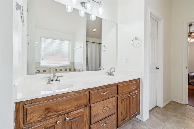 2632 SE 97th St, Moore, OK 73160 - bathroom with double vanity, connected bathroom, and tile patterned floors