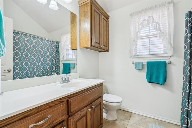 2632 SE 97th St, Moore, OK 73160 - full bath featuring vanity, toilet, tile patterned flooring, and lofted ceiling