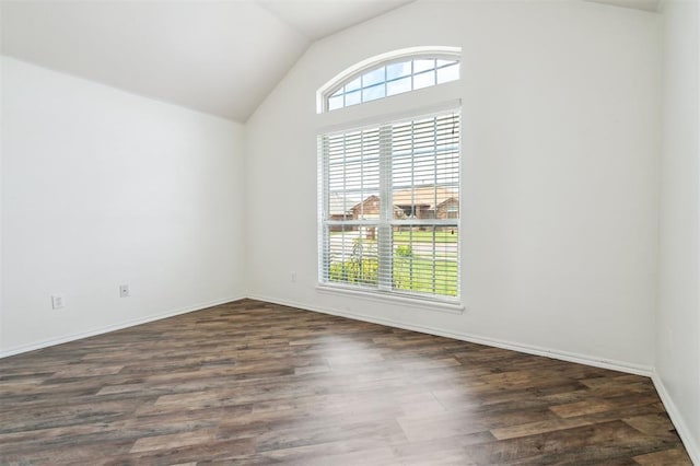 2632 SE 97th St, Moore, OK 73160 - empty room featuring lofted ceiling, dark wood-style floors, and baseboards