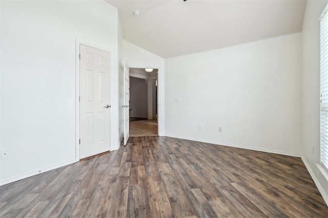 2632 SE 97th St, Moore, OK 73160 - unfurnished room featuring lofted ceiling, wood finished floors, baseboards, and a smoke detector