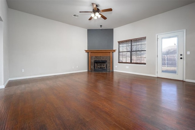 1704 Sumac Dr, Norman, OK 73071 - unfurnished living room with ceiling fan, a premium fireplace, wood finished floors, and baseboards