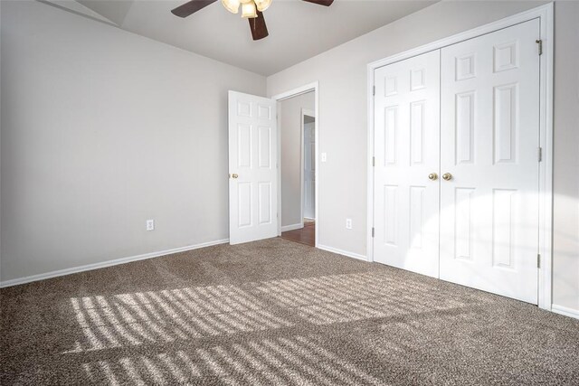 1704 Sumac Dr, Norman, OK 73071 - unfurnished bedroom featuring carpet flooring, baseboards, a closet, and ceiling fan