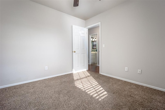 1704 Sumac Dr, Norman, OK 73071 - carpeted spare room featuring a ceiling fan and baseboards