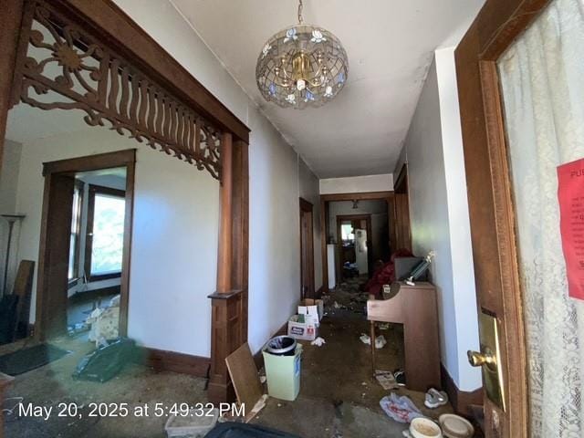 820 NW E St, Ardmore, OK 73401 - corridor with a chandelier