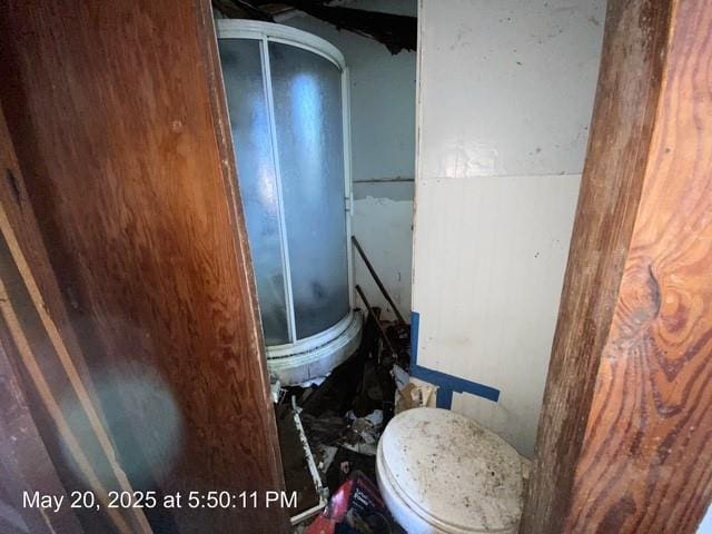 820 NW E St, Ardmore, OK 73401 - full bathroom with toilet and a stall shower