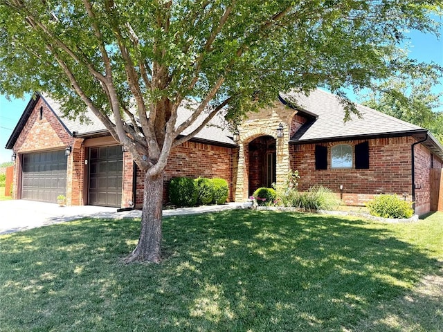 3001 Flint Ct, Oklahoma City, OK 73165 - view of front of home with brick siding, a front yard, a garage, and concrete driveway