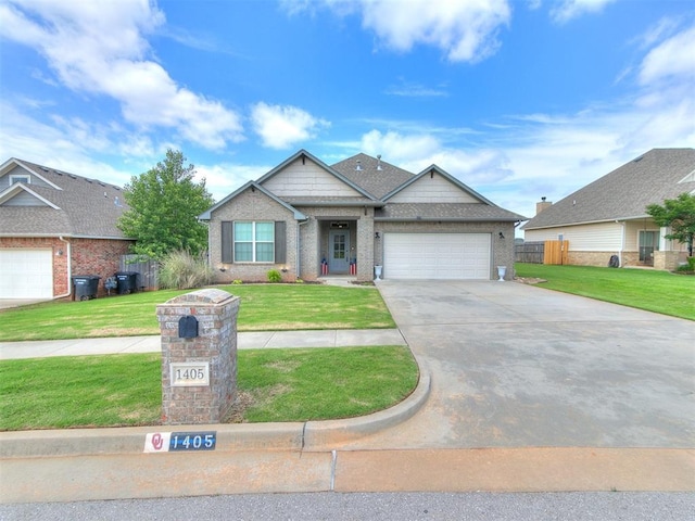 1405 Atalon Dr, Moore, OK 73160 - view of front of house with a garage, concrete driveway, and brick siding