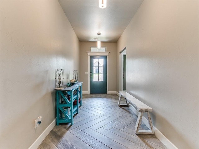 1405 Atalon Dr, Moore, OK 73160 - doorway to outside featuring baseboards