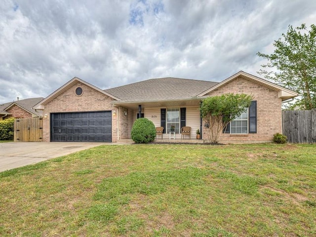2121 NE 13th St, Moore, OK 73160 - ranch-style home with brick siding, concrete driveway, a garage, and covered porch