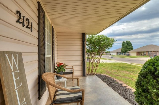 2121 NE 13th St, Moore, OK 73160 - porch with a lawn