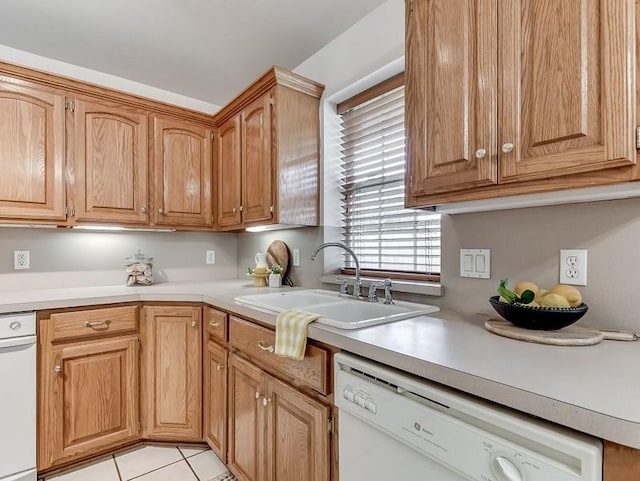 2121 NE 13th St, Moore, OK 73160 - kitchen with white dishwasher, a sink, light countertops, and light tile patterned floors