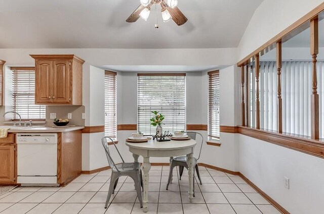 2121 NE 13th St, Moore, OK 73160 - dining area with a ceiling fan, baseboards, and light tile patterned floors