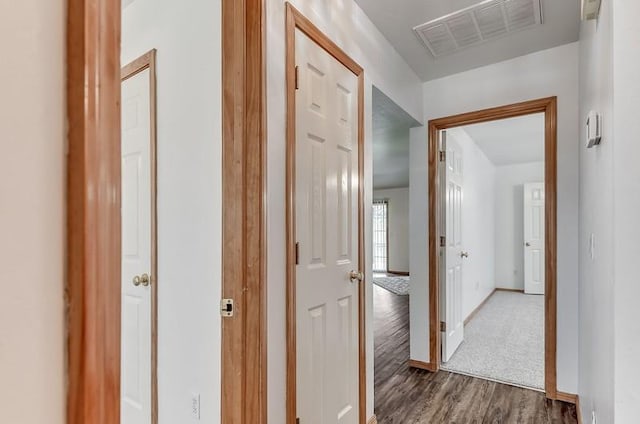 2121 NE 13th St, Moore, OK 73160 - corridor featuring wood finished floors and baseboards