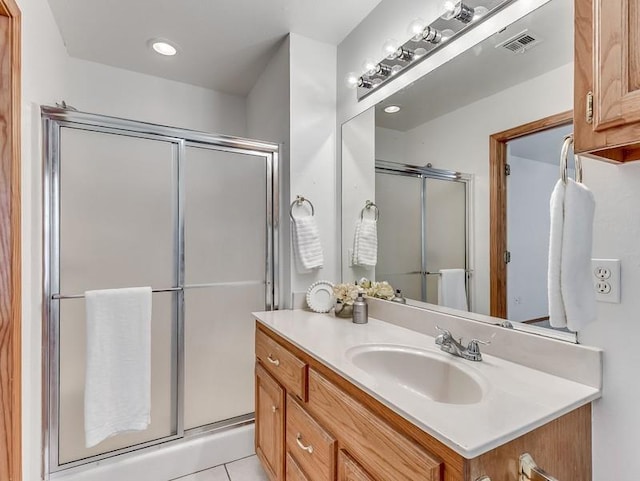2121 NE 13th St, Moore, OK 73160 - bathroom with vanity and a stall shower