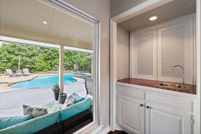 1704 Faircloud Dr, Edmond, OK 73034 - view of swimming pool with a sink