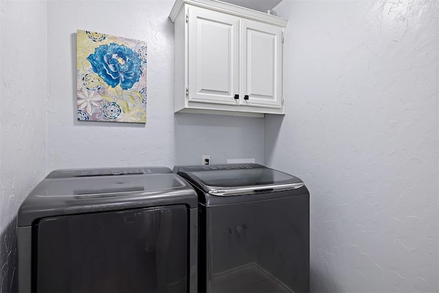 1704 Faircloud Dr, Edmond, OK 73034 - laundry room with cabinet space and washing machine and clothes dryer