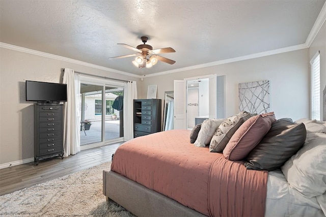 1704 Faircloud Dr, Edmond, OK 73034 - bedroom featuring access to exterior, light wood finished floors, ornamental molding, baseboards, and ceiling fan